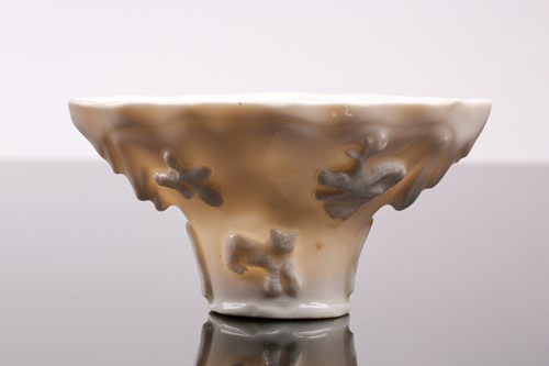 Lot 101 - A Chinese blanc de chine libation cup, Qing...