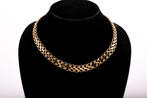 Lot 399 - A mid 20th century yellow metal articulated...
