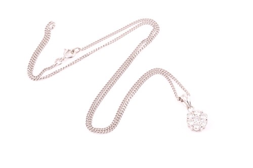 Lot 111 - A 14ct white gold and diamond floral cluster...