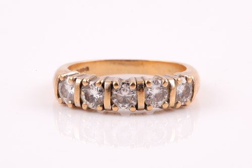 Lot 408 - A five stone half hoop diamond ring, the round...