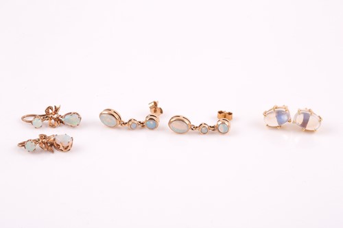 Lot 135 - A pair of yellow metal and moonstone earrings,...