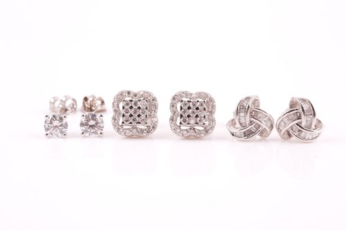 Lot 4 - A pair of 9ct white gold and solitaire CZ stud...