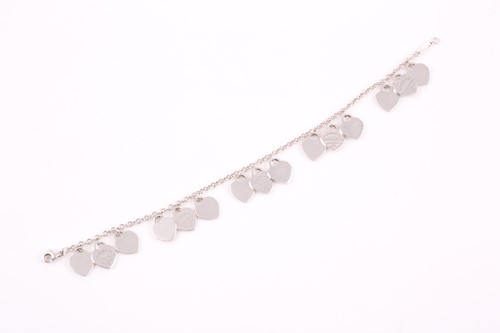 Lot 31 - Tiffany & Co. A silver bracelet set with...