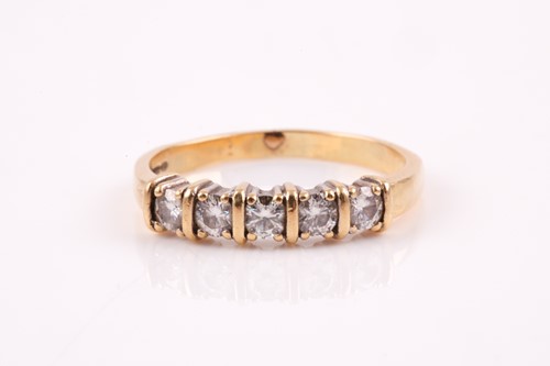 Lot 340 - A five stone half hoop diamond ring, the round...