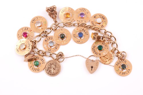 Lot 108 - An unusual yellow metal charm bracelet, set...
