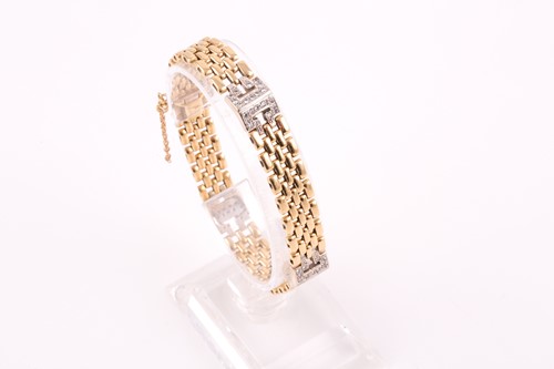 Lot 2 - An 18ct yellow gold and diamond bracelet, the...