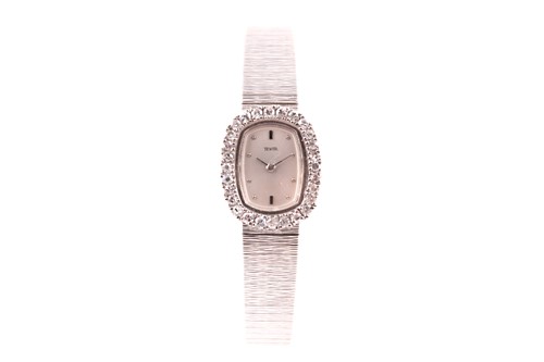 Lot 177 - A white gold and diamond cocktail watch, the...
