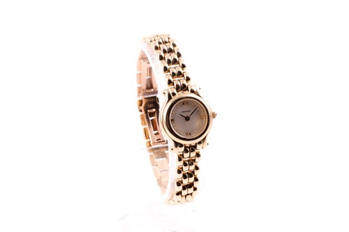 Lot 172 - A ladies yellow metal Movado watch, the round...