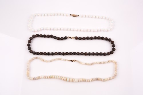 Lot 149 - A faceted opal bead necklace, together with a...