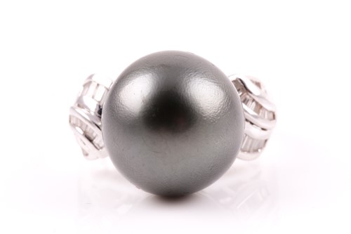 Lot 80 - An 18ct white gold, diamond, and dark grey...