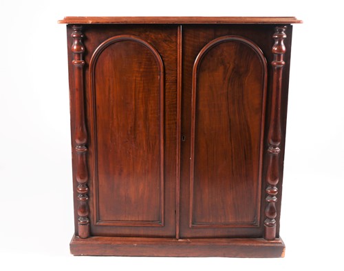 Lot 174 - A Victorian figured walnut freestanding...