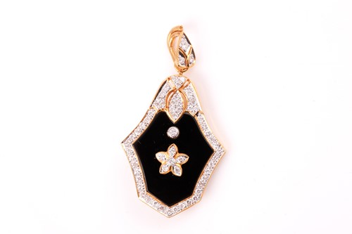 Lot 318 - An onyx and diamond pendant / brooch, the...