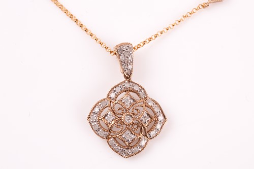 Lot 293 - A diamond pendant, the quatrefoil openwork...