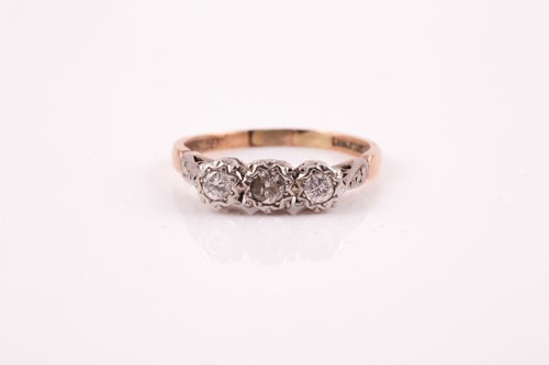 Lot 367 - A three stone diamond half hoop ring, the...