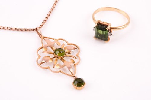 Lot 225 - An 18ct yellow gold and tourmaline ring, set...