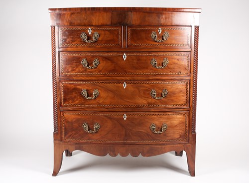 Lot 176 - A George III North Country mahogany bowfront...