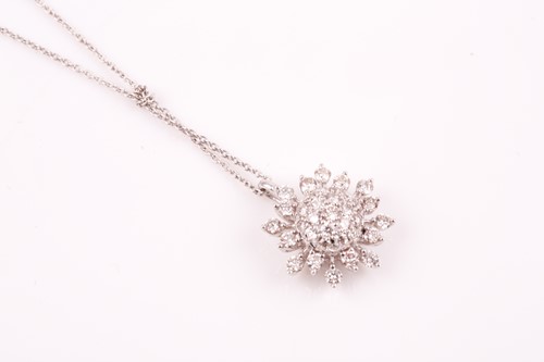 Lot 343 - A diamond cluster pendant; the bombe centre...