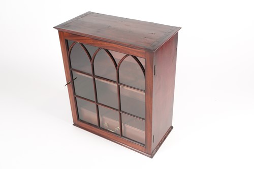 Lot 203 - A George III mahogany hanging single door wall...