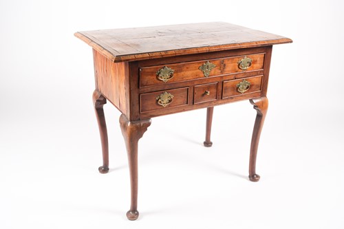 Lot 204 - An early 18th-century regional fruitwood, elm,...