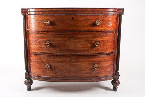 Lot 209 - A Regency figured mahogany break bow-fronted...
