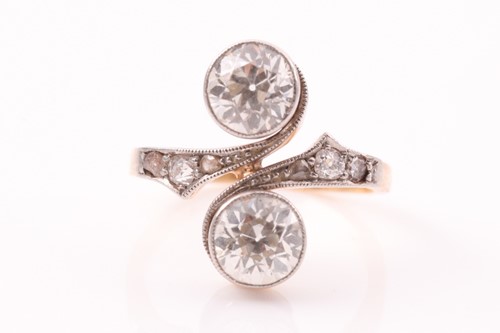Lot 310 - A Belle Epoque 'Toi et Moi' two stone diamond...