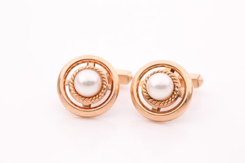 Lot 368 - A pair of yellow metal and pearl cufflinks, of...