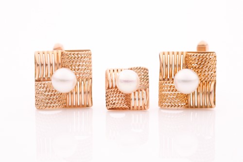 Lot 146 - A pair of yellow metal and pearl cufflinks,...