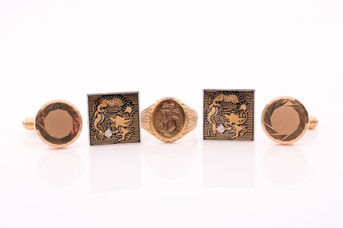 Lot 51 - A yellow metal signet ring, bearing entwined...