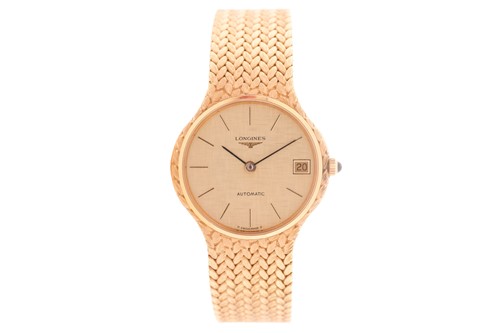 Lot 529 - A Longines 18ct yellow gold automatic dress...