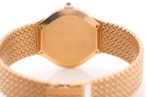 Lot 529 - A Longines 18ct yellow gold automatic dress...