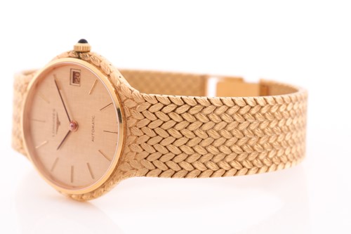 Lot 529 - A Longines 18ct yellow gold automatic dress...