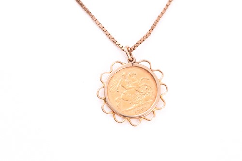 Lot 8 - An 1897 half sovereign pendant, set in a...