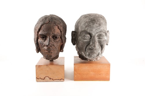 Lot 40 - A stoneware bust of a elderly lady, her hair...