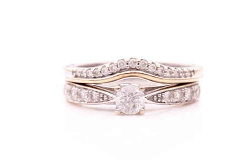 Lot 143 - A 9ct white gold and diamond engagement ring,...