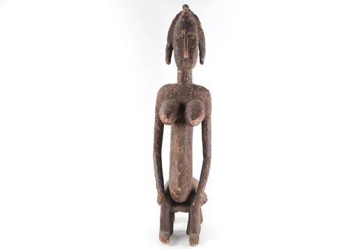 Lot 170 - A large Dogon seated female figure, Mali, in...