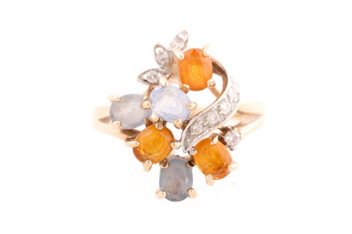 Lot 25 - A 9ct yellow gold, two colour sapphire and...
