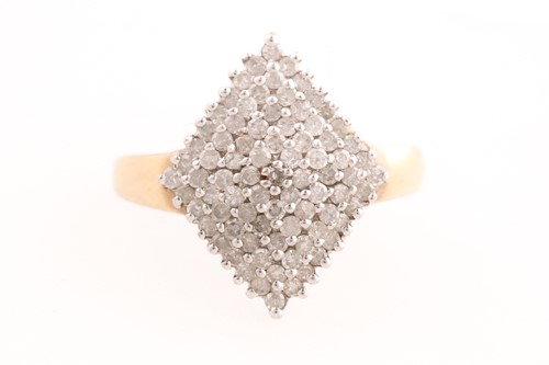 Lot 62 - A lozenge-shaped diamond cluster ring. the...