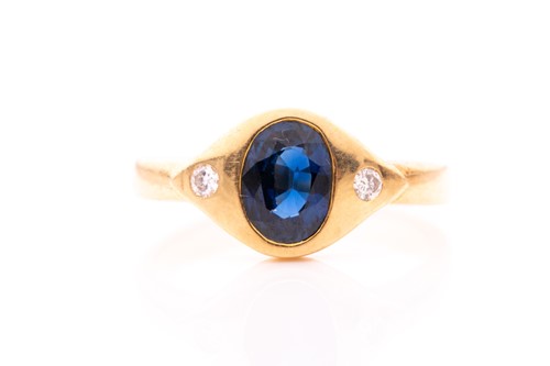 Lot 134 - An 18ct yellow gold, sapphire, and diamond...