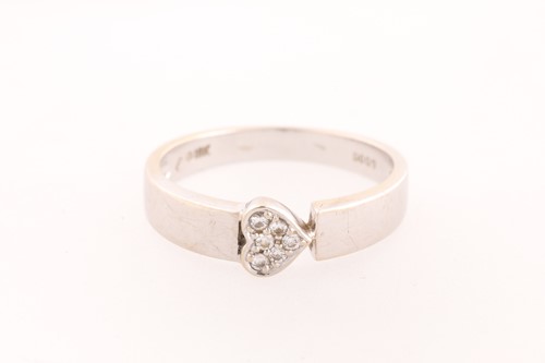 Lot 13 - A heart-shaped diamond cluster ring. the pave...