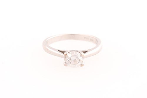 Lot 339 - A single stone diamond ring, the round...