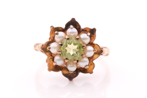 Lot 36 - A 9ct yellow gold, peridot, and seed pearl...