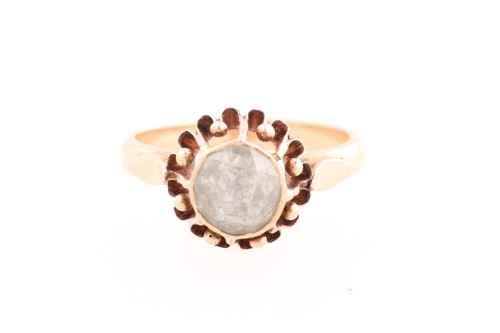 Lot 95 - A single stone diamond ring; the faceted...