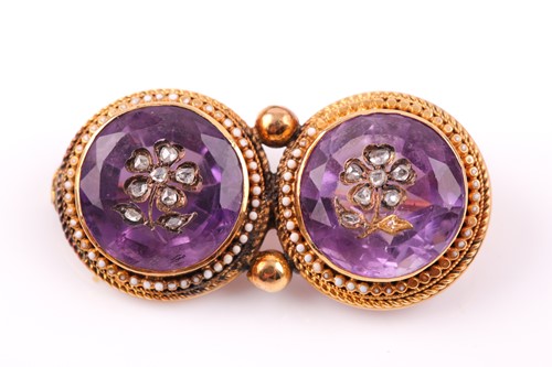 Lot 69 - A Victorian yellow gold and amethyst double...