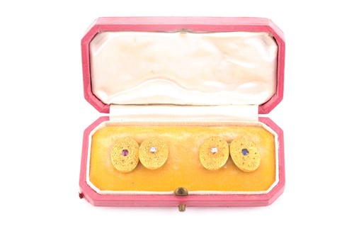 Lot 313 - A pair of 18ct yellow gold cufflinks, the oval...