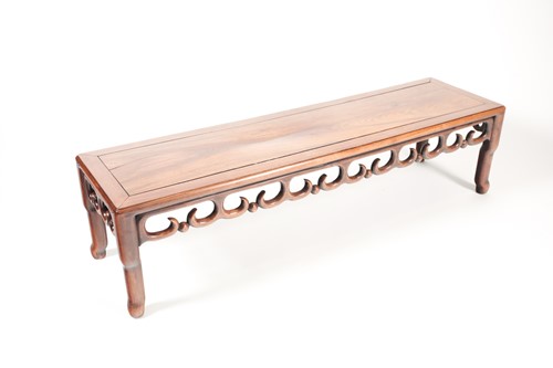 Lot 148 - A Chinese carved and pierced hardwood K'ang...