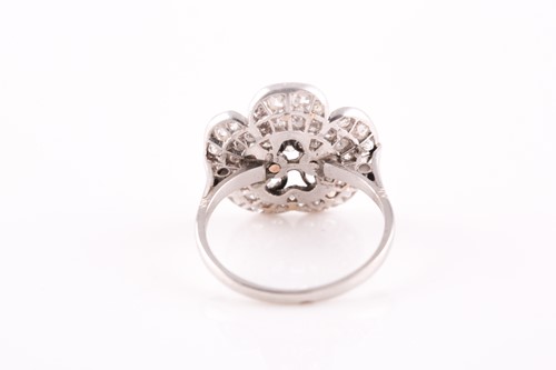 Lot 1 - A platinum and diamond floral cluster ring,...