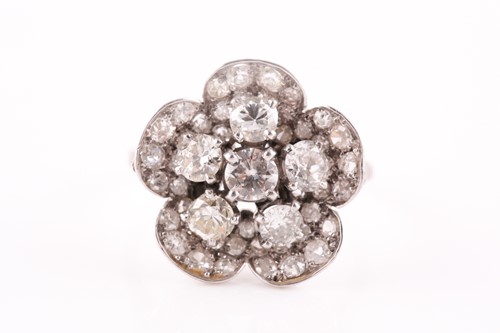 Lot 1 - A platinum and diamond floral cluster ring,...