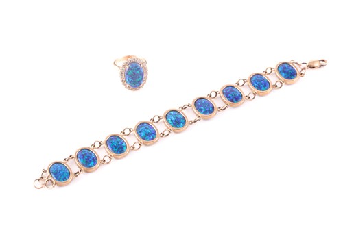 Lot 53 - A yellow metal, diamond, and synthetic opal...