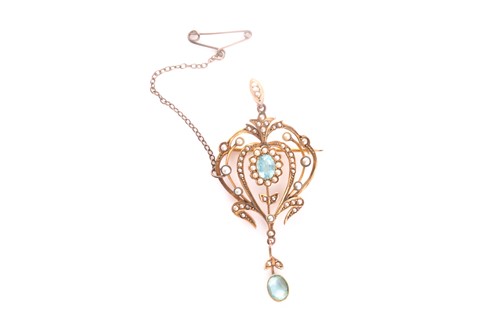 Lot 50 - An Edwardian yellow metal, topaz, and split...