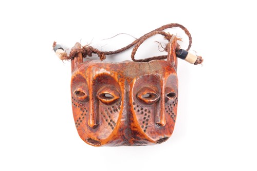 Lot 174 - A Yombe ivory passport type mask, Democratic...